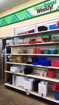 the shelves are filled with plastic containers and baskets for sale at walmart's weekly