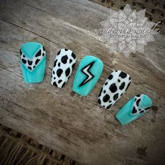 Ombre turquoise & silver cow print nails with a lightning bolt feature.  Gloss finish *Short & Long Coffin shape shown. Each set is unique, no two sets are identical. Your new salon quality nail enhancements made by a professional nail artist, come with 10 custom nails with protective packaging, detailed instructions for application & removal. One application kit included per order, not per set. Kit includes: A cuticle pusher, wood file, buffer, alcohol wipe, nail tabs, glue & a lotion spatula. Additional application kit, glue or tabs available in "extras" section. Made with Professional only products. Vegan, Cruelty & 10 free. Eco-friendly protective packaging for minimal shipping costs. *For Custom Sizes, please order Sample Sizing Kit or measure yourself prior to selecting sizes. *Pleas Nails Lightning Bolt, Western Nails Country, Nails Cowgirl, Lightning Bolt Nails, Nails Cow Print, Cowgirl Nails, Lightning Nails, Country Acrylic Nails, Cow Print Nails