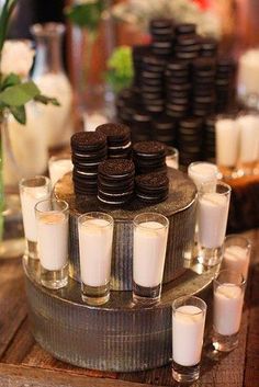 an assortment of cookies and glasses on a table