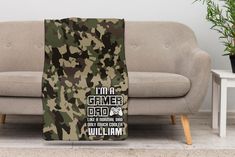 a camo blanket that says i'm a gamer dad