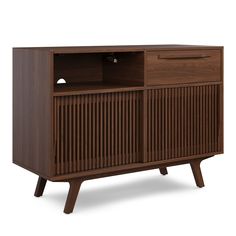 Tell me your favorite film is "High Fidelity" without telling me your favorite film is "High Fidelity." Alright, enough with the jokes. Our new version of the popular Jokuna Media Unit includes a flip-top lid designed to accommodate a turntable, with a record sleeve holder to display your chosen LP � we know what matters. With its slatted sliding doors for record storage on one side and space for speakers, an amp, or a gaming console on the other, our Jokuna Vinyl Media Unit is the answer to you Mid Century Modern Media Console, Hifi Furniture, Record Player Cabinet, Media Units, Turntable Stand, Record Stand, Article Furniture, Media Consoles, Modern Dining Tables