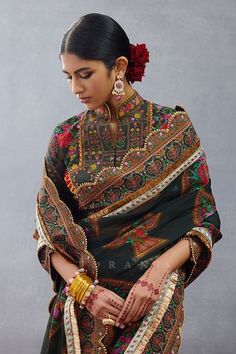 Black half sleeves high mandarin collar padded blouse crafted in slub silk with all over blossom print and thread tassels embellishments. - Aza Fashions Bohemian Blouse With Printed Motifs For Weddings, Multicolor Printed Motifs Blouse For Wedding, Multicolor Printed Blouse For Wedding, Multicolor Printed Wedding Blouse, Elegant Festive Blouse With Printed Motifs, Traditional Blouse With Printed Motifs And Traditional Drape, Traditional Blouse With Printed Motifs, Traditional Festive Blouse With Printed Motifs, Festive Traditional Blouse With Printed Motifs