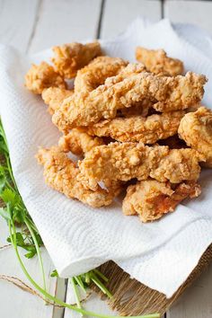 some fried food is sitting on a napkin