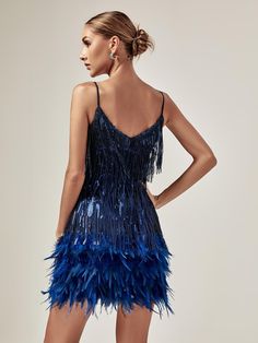 Austyn Tassel Feather Mini Dress In Royal Blue is destined to make herself known at the most extravagant parties. The ultimate show-stopping, party dress you will stand out wearing her. Adorned in pink fringing and sequins with flat beaded panelling on the waist to accentuate your curves and flatter your figure. Individually hand embellished with white crystal waterfall fringe to create a mesmerising illusion when worn. Material: 100% polyester Invisible zipper opening at the back Stretch Factor: Non Stretch Clean: Dry clean only Color may vary due to the lighting on images. The product images (without model) are the closest to the true color of the product Model is wearing an S This product comes in two versions - the old version with green spaghetti straps, and the new version with shoul Feather Cocktail Dress, Feather Mini Dress, Marine Uniform, Jumpsuits And Romper, Feather Dress, Fringe Dress, Blue Mini Dress, Maxi Dress Green, White Crystal