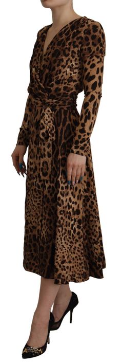 DOLCE & GABBANA Gorgeous brand new with tags, 100% Authentic DOLCE & GABBANA stretch wrap dress features v-neckline with back zip closure, waist belt and long sleeves. Model: A-line Maxi dress Color: Brown Zipper closure Logo details Made in Italy Material: 95% Viscose 5% Elastane Animal Print Clothes, Woman Vest, A Line Maxi Dress, Blazer Suit Women, Buy Sweaters, Viscose Dress, Dolce E Gabbana, Brown Leopard, Womens Tights