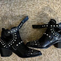 Elevate Your Style With These Stunning Kurt Geiger Studded Ankle Boots In Size 9 For Women. These Boots Are Perfect For Any Occasion, Whether You're Dressing Up For A Formal Event Or Keeping It Casual On A Night Out. The Sleek Black Color And Elegant Design Make Them A Versatile Addition To Any Wardrobe. Crafted With High-Quality Leather And Featuring A Comfortable Leather Lining, These Boots Are Both Stylish And Practical. The Outsole Is Also Made Of Leather For Durability And Added Comfort. Th