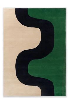 an abstract rug with black, white and green shapes on the bottom right hand side