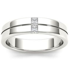 a white gold ring with a princess cut diamond