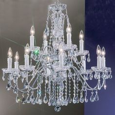 a crystal chandelier hanging from the ceiling