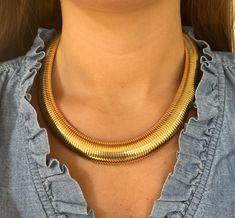 Unleash your wild side with the Lock Up Cobra Necklace. This 18.5" gold coil necklace features a stunning cobra design that is sure to grab attention. With a 2" extender and perfect pairing with our cobra bracelets, this one-of-a-kind piece will make sure you don't go unnoticed. Cobra Necklace, Lock Up, Perfect Pair, Gold, Design