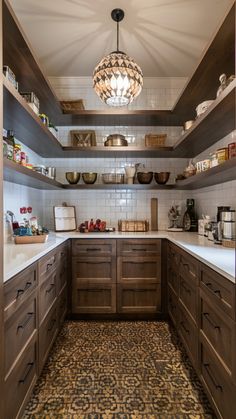 a kitchen with wooden cabinets and tile flooring