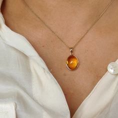 Orange Pendant Necklace, 14k Gold Oval Amber Jewelry, Oval Citrine Amber Necklace, Oval Amber Citrine Necklace, Yellow 14k Gold Oval Necklace, Orange 14k Gold Jewelry With Polished Finish, Yellow Oval 14k Gold Necklace, Oval Yellow 14k Gold Necklace, Oval Amber Birthstone Jewelry