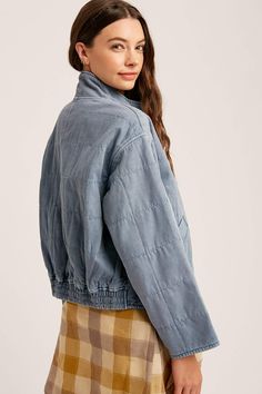 -Color: Denim -Garment washed cotton denim with padded -Dolman style sleeves -Front zip closure -Hip pockets -Smocked elastic band in back -Solid stripe detailing down the sleeves -Lined -Content: 100% Cotton -Imported -Model is 5'10" 32-26-35 and wearing a size Small Urban Cotton Denim Jacket With Zipper, Urban Cotton Denim Jacket With Zipper Closure, Denim Blue Cotton Denim Jacket With Zipper, Utility Cotton Outerwear In Light Wash, Washed Denim Blue Cotton Outerwear, Denim Blue Washed Cotton Outerwear, Light Wash Cotton Utility Outerwear, Trendy Washed Blue Cotton Outerwear, Washed Blue Cotton Outerwear With Relaxed Fit