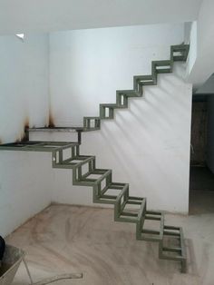 an empty room with some stairs in it