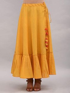 Yellow Umbrella Tiered Cotton Skirt By The Neem Tree now available at Trendroots Cotton Ankle-length Maxi Skirt For Summer, Flowy Cotton Ankle-length Maxi Skirt, Yellow Bohemian Tiered Maxi Skirt, Yellow Flowy Ruffled Maxi Skirt, Flowy Yellow Ruffled Maxi Skirt, Yellow Bohemian Skirt With Ruffles, Yellow Gathered Tiered Skirt, Yellow Tiered Gathered Skirt, Yellow Ruffled Maxi Skirt For Summer