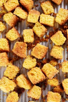 some food that is on top of a grilling pan and has been cut into cubes