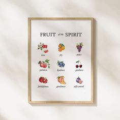 the fruit of the spirit poster is displayed on a white wall above a wooden frame