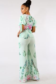 This sweet floral blossom palazzo set features, a non-stretch fabric, wrap top, v-neckline, short puff sleeves, sleeves and waistline tie straps, high waist palazzo pants, wide bottoms, finished with a hidden back zipper closure. Model is wearing a small 100% Polyester Hand wash cold water Do not bleach Two Piece Pant Set High Waist, Pallazo Outfit Palazzo, Pallazo Outfit, Two Piece Outfits Pants High Waist, Ankara Jumpsuits For Women, Tops For Palazzo Pants, High Waist Palazzo Pants, Two Piece Outfits Pants, Palazzo Pants Outfit