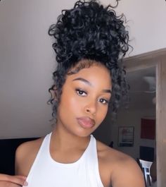 Updo Hairstyles For Black Women Curly Hair, Curly Bun Aesthetic, Curly Bun Black Women Weave, Curly Top Bun Hairstyles For Black Women, Top Knot Curly Bun, Cute Curly Ponytails For Black Women, Messy Curly Bun Black Women, Natural Curly Bun Black Women, Two Curly Buns With Weave