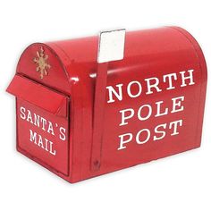 a red mailbox with santa's pole post written on the front and side