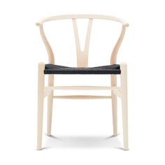 a white chair with black seat and back rest on a white background, it's made from wood