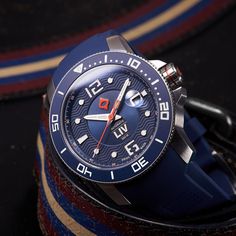 The GX-Diver's 44mm Steel Cobalt features a unique blue dial, an Elaboré grade, 26-jewel Swiss automatic movement, date cyclops magnification, a 42-hour power reserve, a surgical grade 316L stainless steel case with skeleton case-back, unidirectional 120-click matte blue bezel ring, a scratch-resistant & anti-reflective sapphire crystal, a screw-down crown, and water-resistant to 300 meters. Blue Round Watch With Tachymeter, Blue Automatic Round Watch Accessory, Liv Watches, Stainless Bracelet, Divers Watch, Bezel Ring, Watch Lover, Blue Waves, Dive Watches