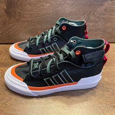 New Adidas Originals Nizza Hi Dl Sneakers Gz2653 Men's Size 6 Or Women's 7.5 Men’s Size: 6 Or Women's Size: 7.5 Color: Black, Green, Orange, White Style No: Gz2653 Brand New With Tags And Never Worn. No Original Box. Please See Photos And Check For Details. Photos Are Of The Actual Shoes That You Will Receive. Also, Please Be Aware That Sometimes Items Can Show Darker Or Lighter In Digital Photographs, But We Always Try To Represent The Items As Accurately As Possible. All Items Come From A Smok Custom Adidas High-top Casual Sneakers, Casual Adidas Custom High-top Sneakers, Adidas Lace-up High-top Sneakers For Streetwear, Black Skate Shoes With Vulcanized Sole For Outdoor, Casual Adidas Logo Custom Lace-up Sneakers, Sporty Skate Shoes With Laces For Outdoor, Sporty Outdoor Skate Shoes With Laces, Adidas Mid-top Sneakers With Vulcanized Sole, Adidas Urban Custom Lace-up Sneakers