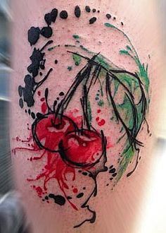 a tattoo on the leg of a person with an umbrella and cherries painted on it