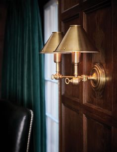 a lamp that is on the side of a door