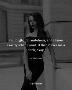 a woman leaning against a wall with the quote i'm rough, i'm ambitious and i know exactly what i want