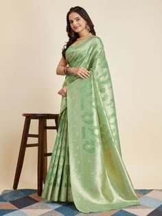 Elevate your ethnic wardrobe with our captivating green zari weaving banarasi silk function wear saree. This stunning saree is crafted from high-quality banarasi silk material, known for its luxurious texture and comfortable drape. The saree features intricate zari weaving work that adds a touch of elegance and sophistication to your look. Pair it with the matching banarasi silk blouse that also boasts the same zari weaving work for a coordinated and chic ensemble.
The saree measures 5.50 meters Green Banarasi Silk Saree With Meenakari, Green Meenakari Saree For Eid, Eid Green Meenakari Saree, Green Tussar Silk Saree With Meenakari, Green Meenakari Tussar Silk Saree, Green Banarasi Silk Traditional Wear With Zari Weaving, Elegant Green Saree With Meenakari, Elegant Green Meenakari Saree, Green Banarasi Silk Saree For Puja