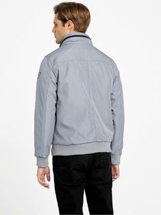 Casual Outdoor Windbreaker With Padded Collar, Sporty Collared Outerwear With Pockets, Casual Hooded Windbreaker With Padded Collar, Casual Windbreaker With Ykk Zipper, Casual Hooded Jacket With Padded Collar, Gray Outerwear With Ykk Zipper For Fall, Casual Outerwear With Padded Collar, Casual Collared Outerwear With Zipper Closure, Casual Long Sleeve Hooded Jacket With Padded Collar