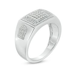 Bring him the bling with this distinctive and sparkling diamond ring. Crafted in sterling silver, this bold design showcases a framed squared diamond composite at its center wrapped in a rectangular diamond border. Shaped side accents filled with diamonds are a unique touch. Handsome with 1/2 ct. t.w. of diamonds and a bright polished shine, this style shimmers. Custom-made to fit his ring size. Sterling silver rings cannot be resized after purchase. Fine Jewelry Square Cut Diamond Ring, White Square Cut Diamond Ring, White Square-cut Diamond Ring, Luxury Diamond Ring With Rectangular Stone For Anniversary, Luxury Rectangular Diamond Anniversary Ring, Dazzling Square-cut Diamond Ring, Diamond White Square Cut Promise Ring, Luxury Diamond Ring With Rectangular Stone, Fine Jewelry Rings With Diamond Accents And Square Cut