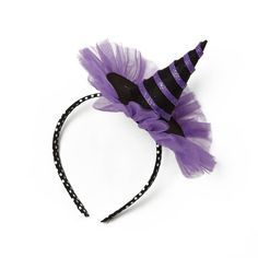 a purple and black headband with a witch's hat on top of it