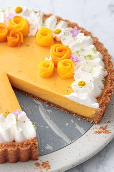 there is a pie with flowers on the top and one slice cut out to show it's filling