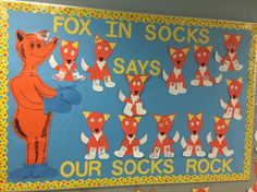 a bulletin board with foxes in socks on it's sides and the words fox in socks says, our socks rock