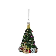 a christmas tree ornament with presents under it