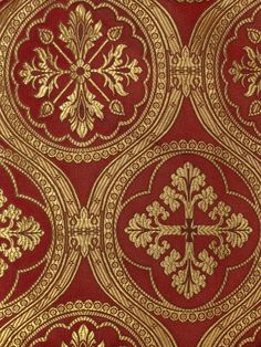 a red and gold wallpaper with ornate designs on it's sides, all in different colors