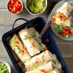 the meal is prepared and ready to be eaten on the table, including tortillas