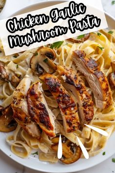 chicken garlic mushroom pasta on a white plate