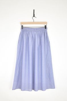 Expertly designed by Ichi Antiquites, this Blue Cotton Khadi Skirt boasts of sustainability and durability. Its handwoven Khadi fabric promises a longer lifespan compared to synthetic fiber, resulting in reduced waste production. By utilizing an eco-friendly manufacturing process, this dress helps conserve energy and natural resources. Sizing + Details → Made In Japan 100% Cotton Khadi, Hand Wash Gathered, Fully Lined Midi Skirt Elastic Waistband With Interior Drawstring Tie Sheer Outskirt & Fully Lined Side Seam Pockets O/S — Waist 13"-21, Hip 25", Length 33.5" Khadi Fabric, Conserve Energy, Natural Resources, Manufacturing Process, Synthetic Fiber, Made In Japan, Jumpsuit Dress, Sustainability, Midi Skirt