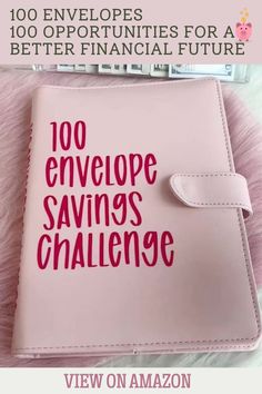 a pink notebook with the words 100 envelope savings challenge written on it