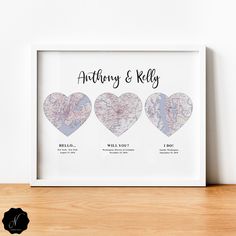 the personalized map heart art print is displayed on a shelf