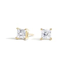 Four-prong Princess Diamond Stud Ears - 18K Yellow Gold. A beautifully matched pair of princess diamonds are secured in classic, four-prong basket settings with comfortable posts for pierced ears. Earrings with a total carat weight of 1.00 carat or over will receive a guardian backing and earrings with a total carat weight under 1.00 carat will receive a push backing. Princess Cut Diamond Earrings Fine Jewelry, Classic White Princess Cut Earrings, Classic Princess Cut Diamond White Earrings, Classic Princess Cut Diamond Earrings, Classic Princess Cut Earrings, Elegant Princess Cut Diamond Earrings With Accents, Classic Radiant Cut Diamond Accent Earrings, Classic Radiant Cut Earrings With Diamond Accents, Classic Radiant Cut Diamond Accented Earrings