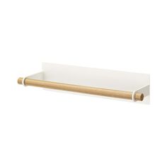 a white shelf with a wooden handle on it