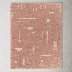 a pink rug with white lines on it