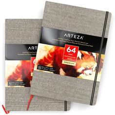 two gray notebooks with red string on each side and an arteza logo on the front