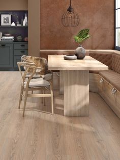 a wooden table sitting in the middle of a living room