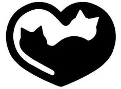 a black and white heart with two cats inside