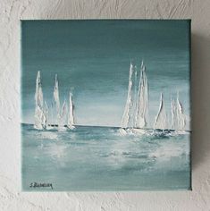 a painting of sailboats sailing in the ocean